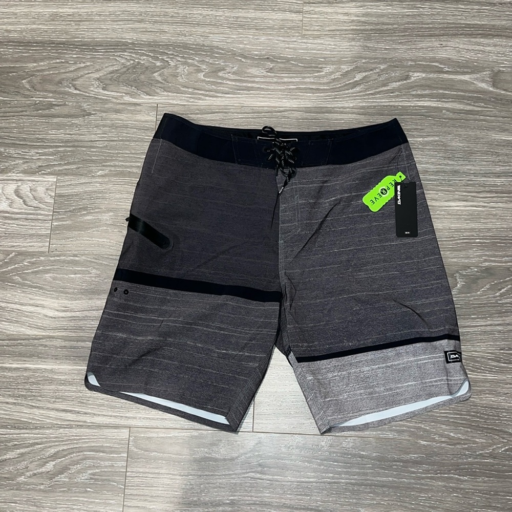 Dakine pavones board shorts. Size 34. NWT
